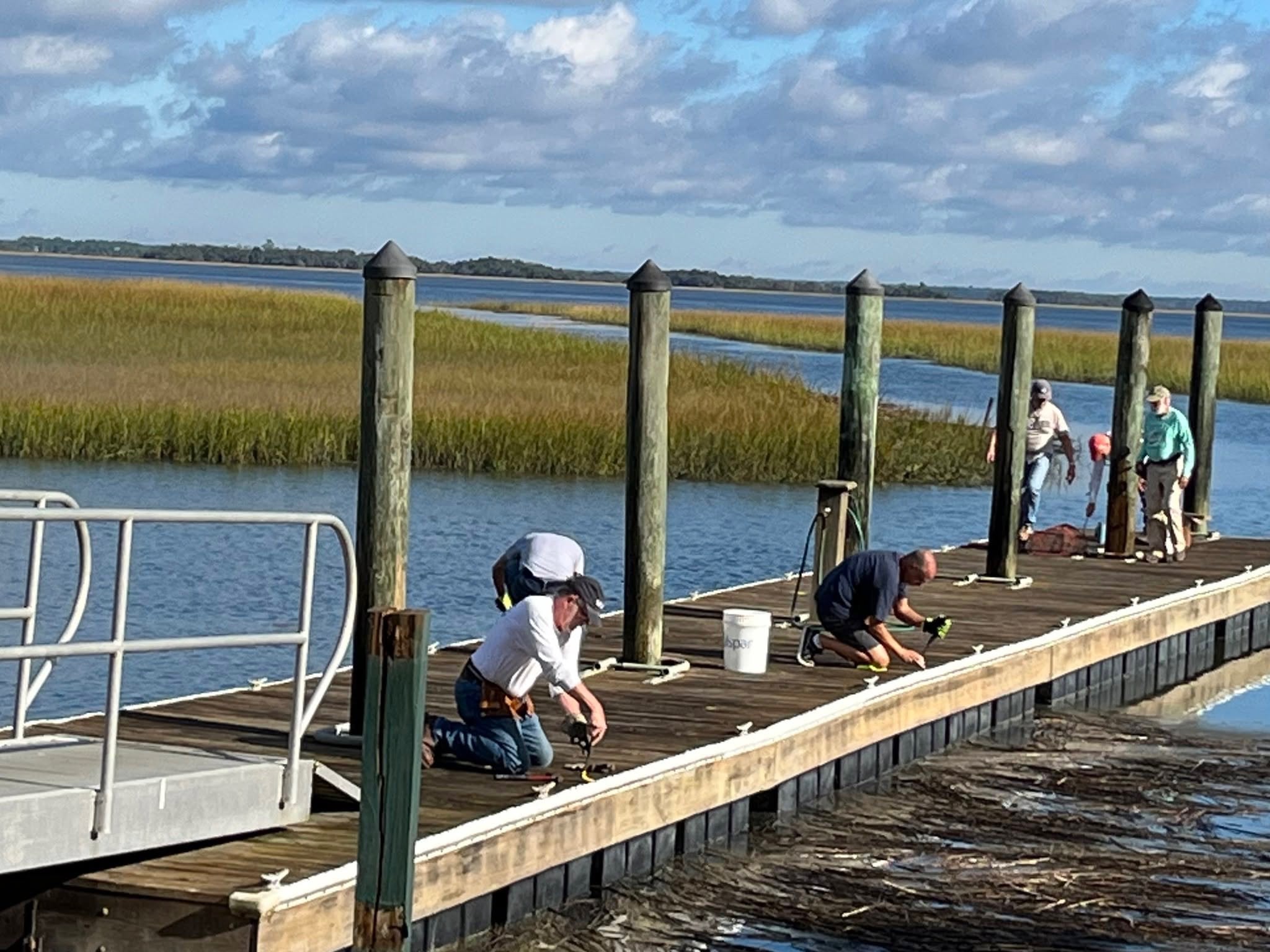 CPV volunteers working on the dock along the Coosaw Point waterway